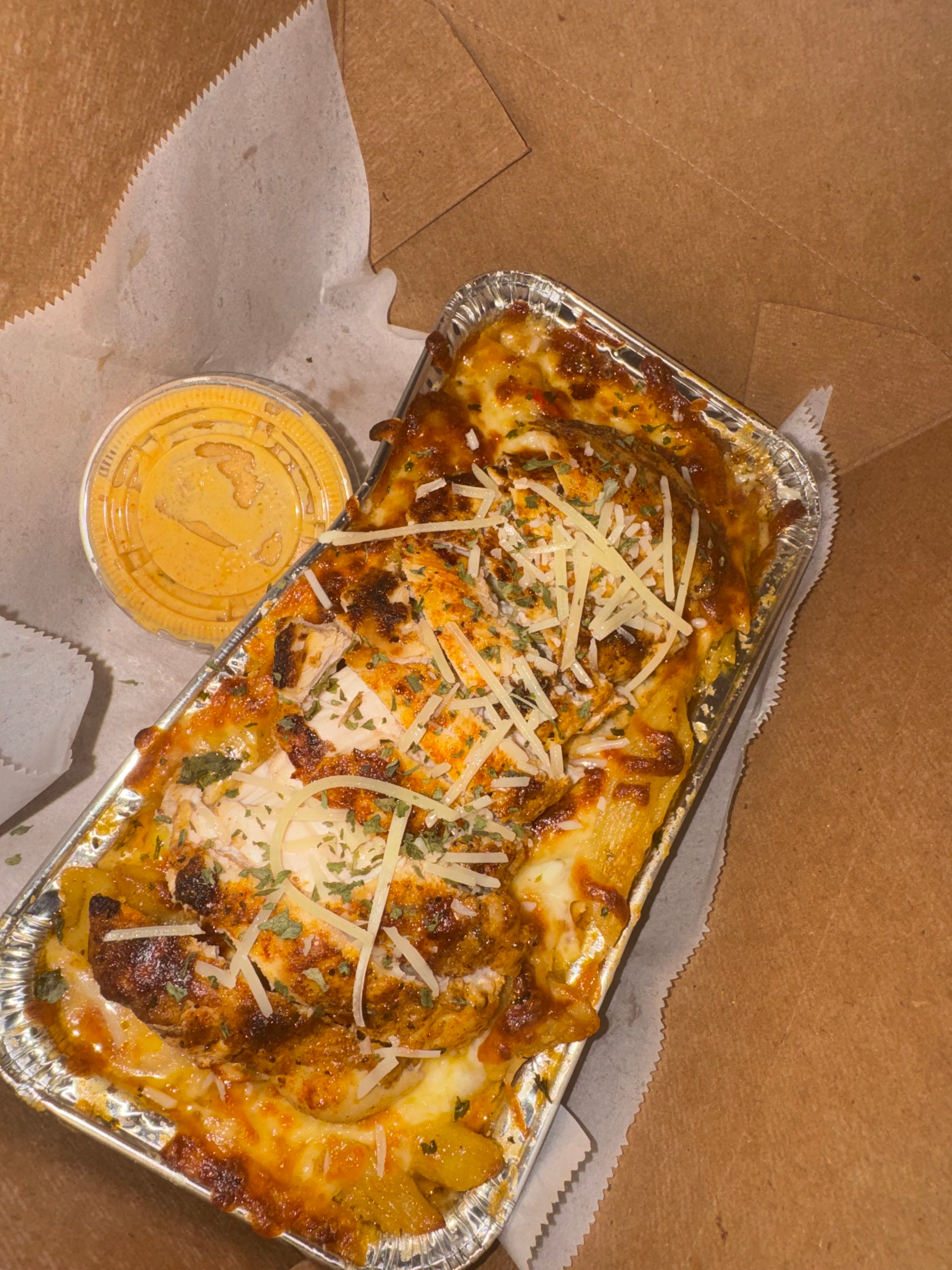 Three cheese Cajun Alfredo topped with chicken